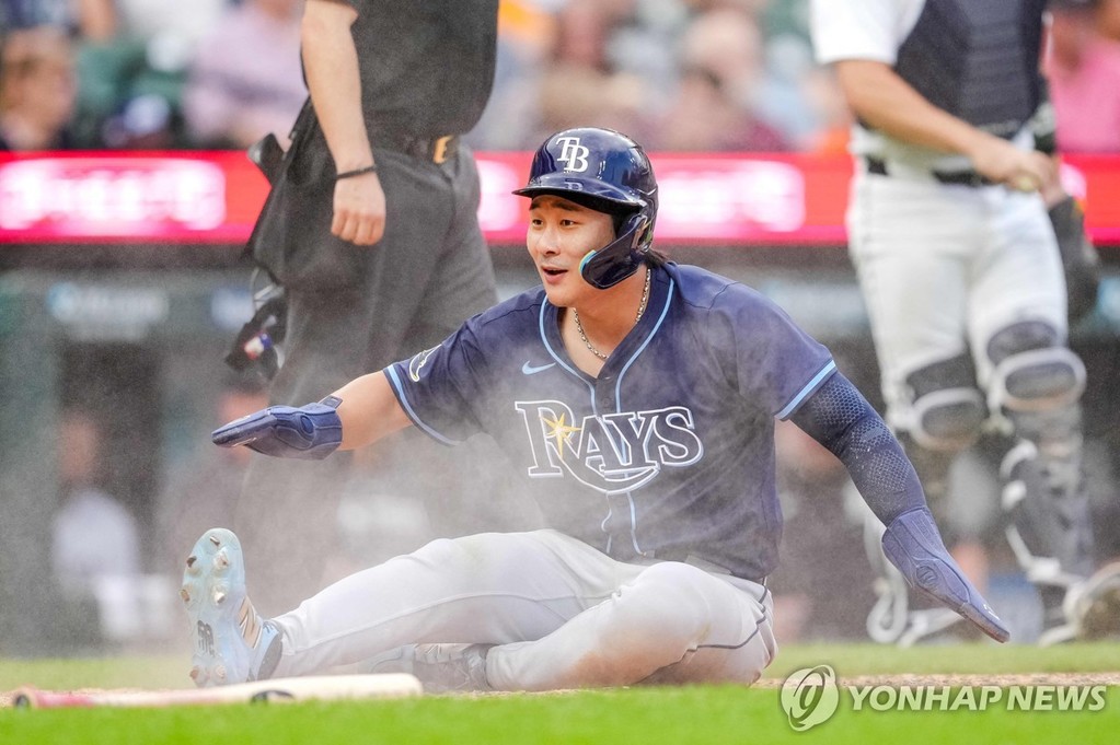 6회 홈에 슬라이딩하며 기뻐하는 김하성 [AFP=연합뉴스]